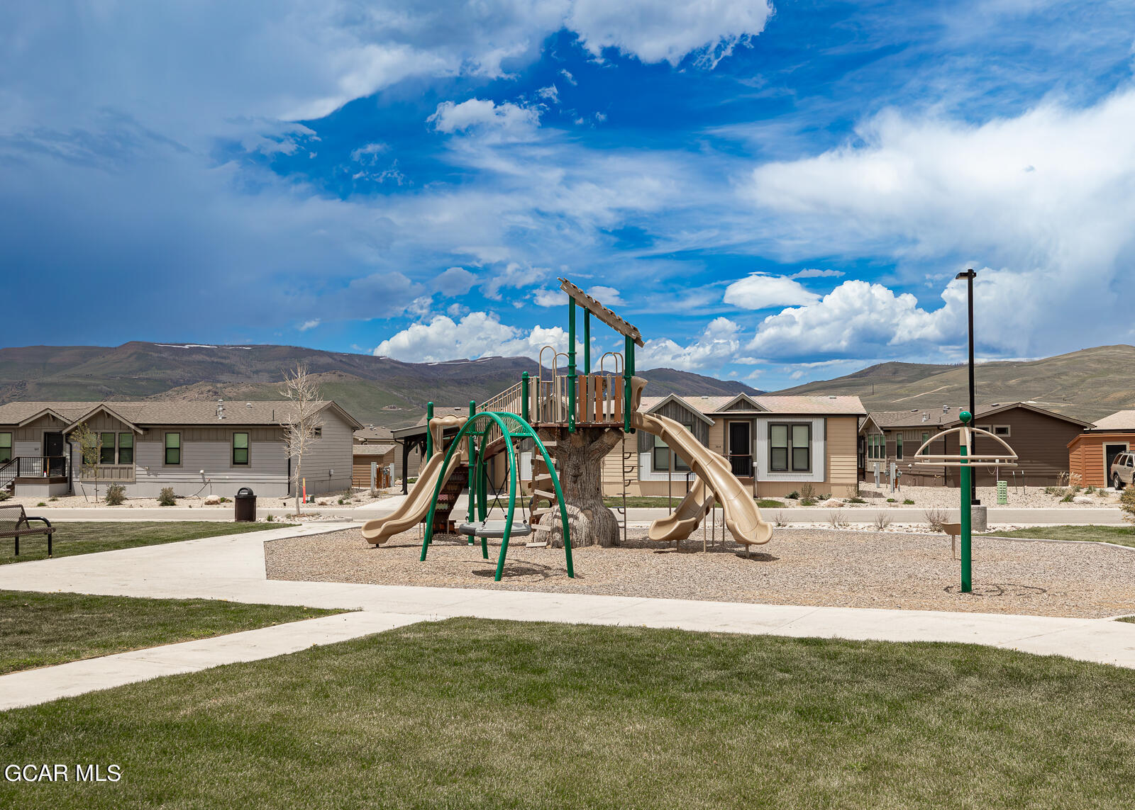 551 Summit Trail, Unit 34 Granby, CO 80446 - Photo 30 of 35 a view of a park with swings