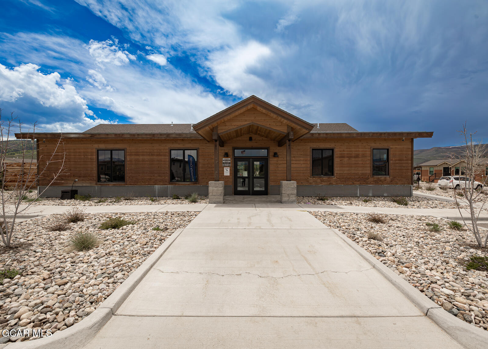 551 Summit Trail, Unit 34 Granby, CO 80446 - Photo 33 of 35 a view of a house with a snow in the yard