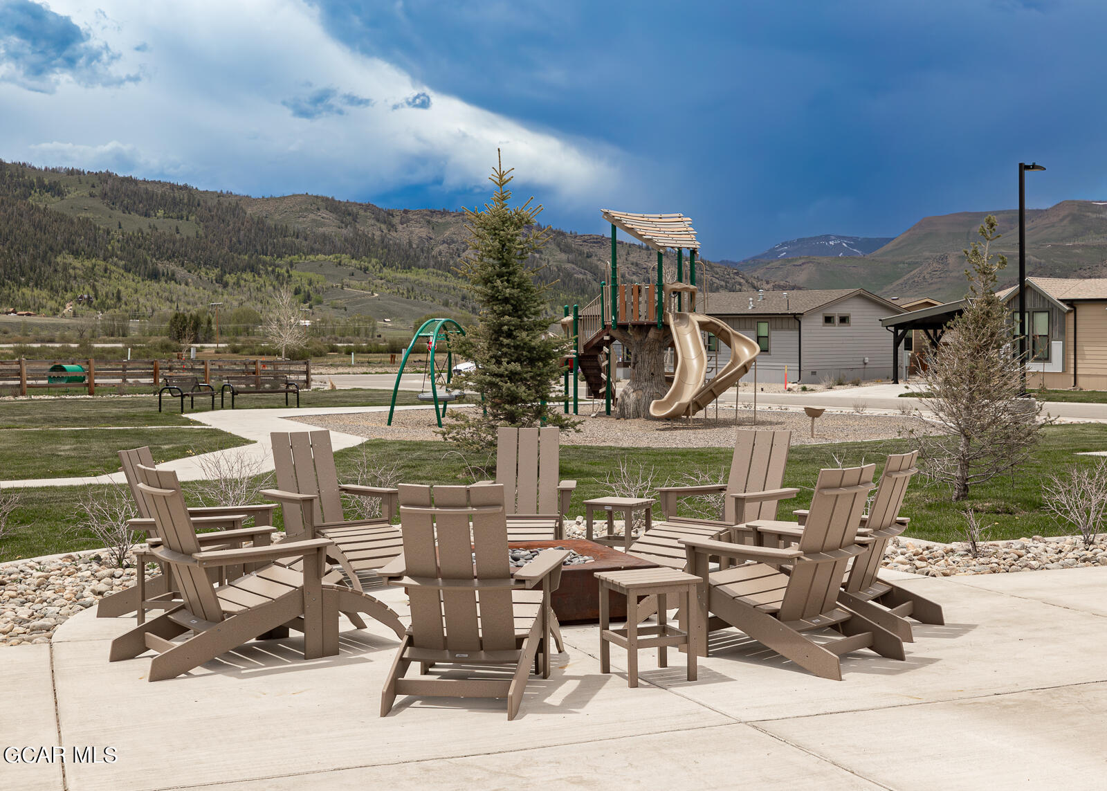 551 Summit Trail, Unit 34 Granby, CO 80446 - Photo 34 of 35 a view of a patio with swimming pool