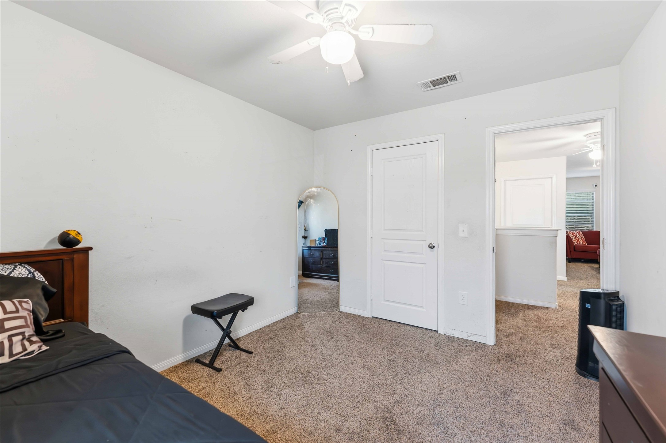 10114 Orchid Spring Lane Houston, TX 77044 - Photo 16 of 22 a view of a room with gym equipment