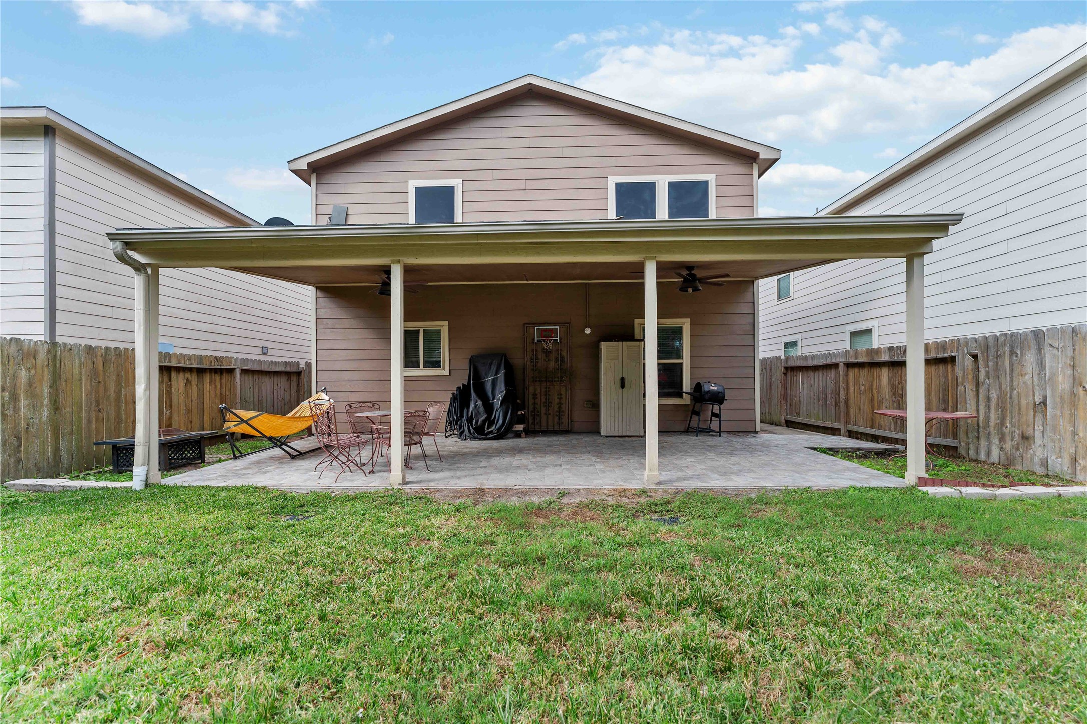 10114 Orchid Spring Lane Houston, TX 77044 - Photo 21 of 22 a view of a house with yard and porch