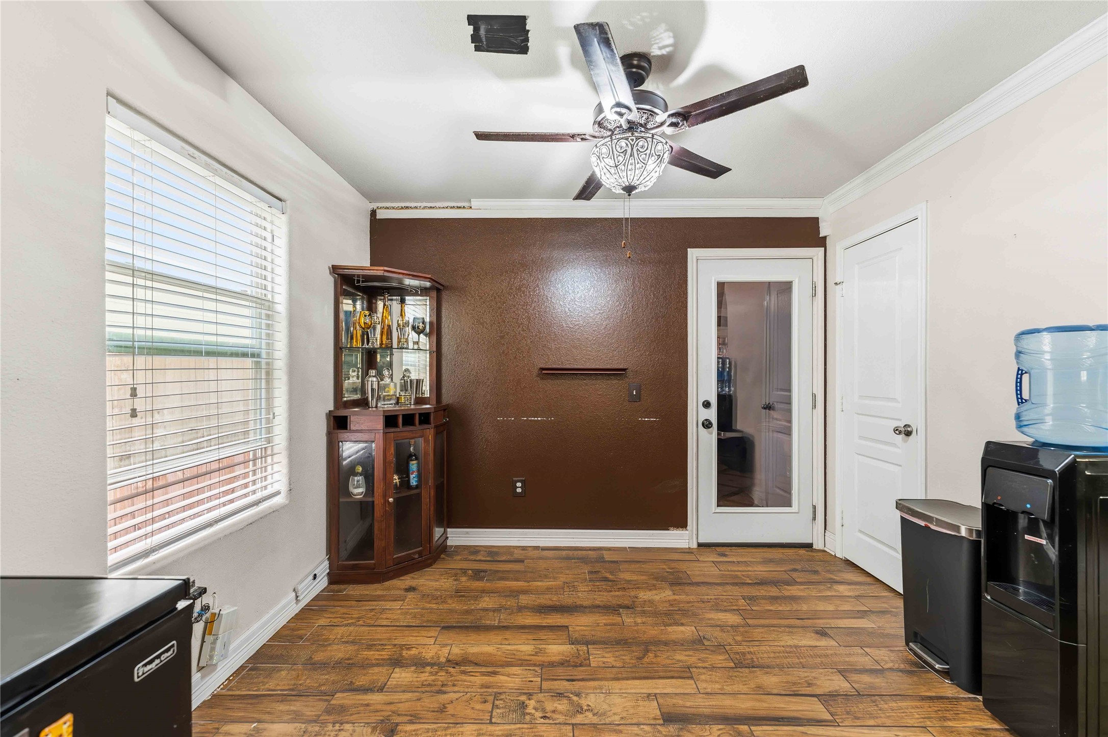 10114 Orchid Spring Lane Houston, TX 77044 - Photo 5 of 22 a view of a livingroom with a ceiling fan and window