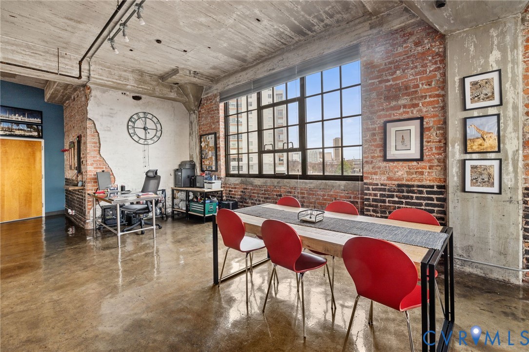 201 Hull Street, Unit U44 Richmond, VA 23224 - Photo 13 of 30 a view of a dining room with furniture and window