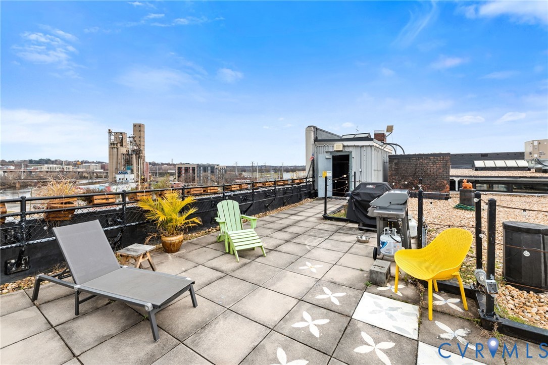 201 Hull Street, Unit U44 Richmond, VA 23224 - Photo 27 of 30 a view of a terrace with chairs
