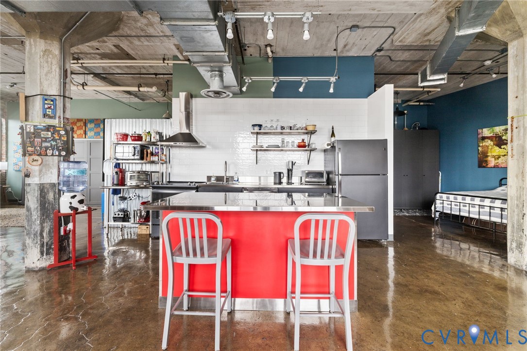 201 Hull Street, Unit U44 Richmond, VA 23224 - Photo 8 of 30 a view of a chairs in a kitchen