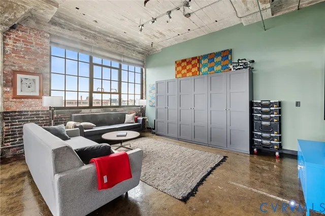 a living room with a couch and a table