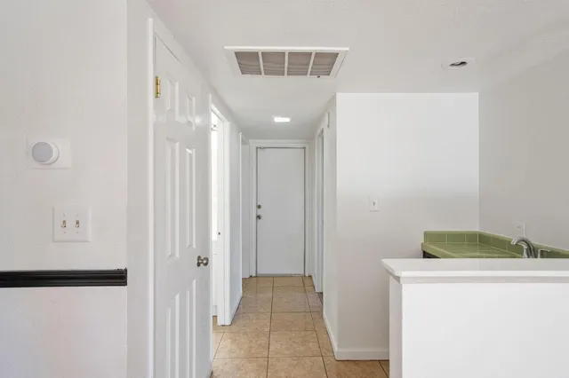 a view of hallway with washer and dryer
