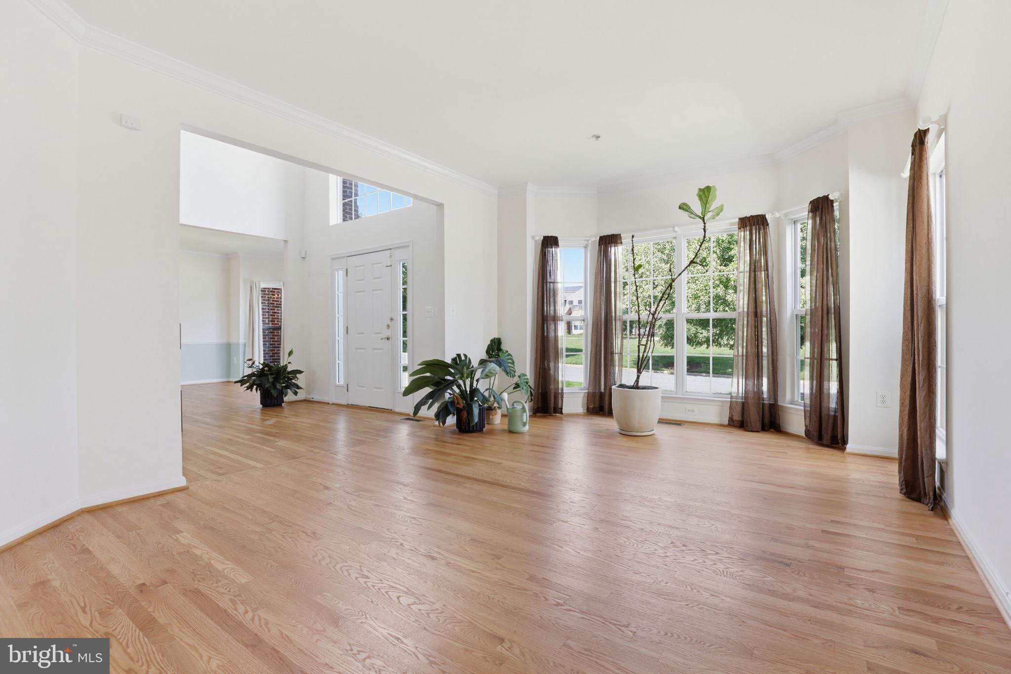 10105 Elgin Circle Bowie, MD 20721 - Photo 6 of 32 a view of a room with furniture and wooden floor