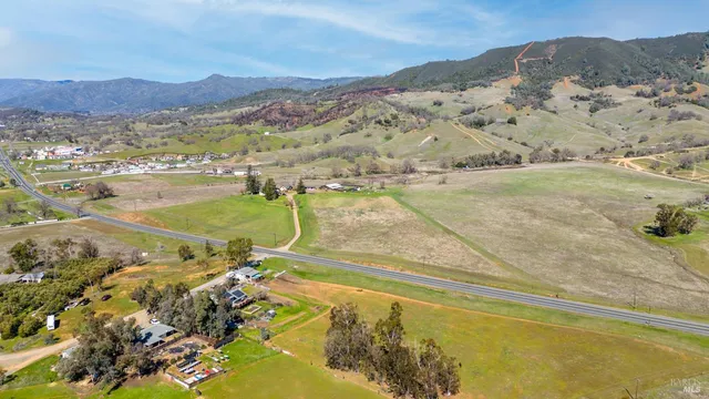 a view of a city with mountains in the background