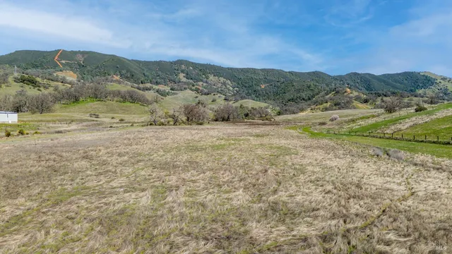a view of mountain view with mountains in the background