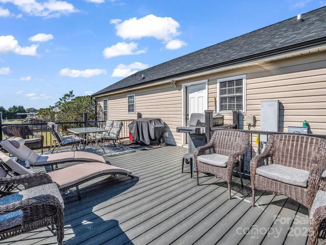 a view of a swimming pool with lounge chair