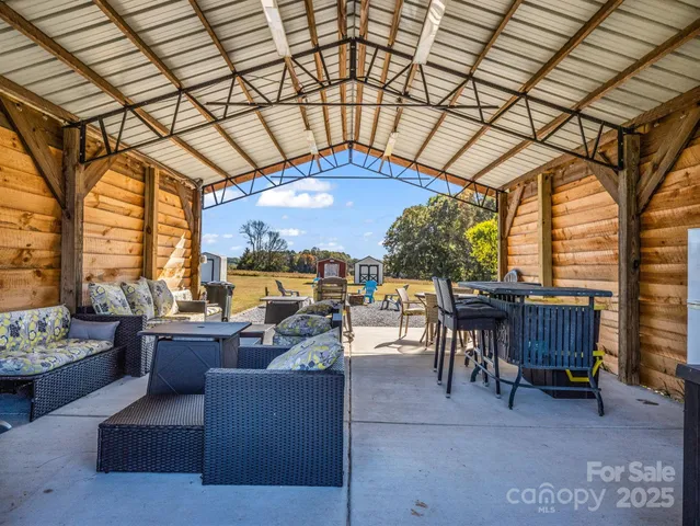 a outdoor living space with furniture and garden view