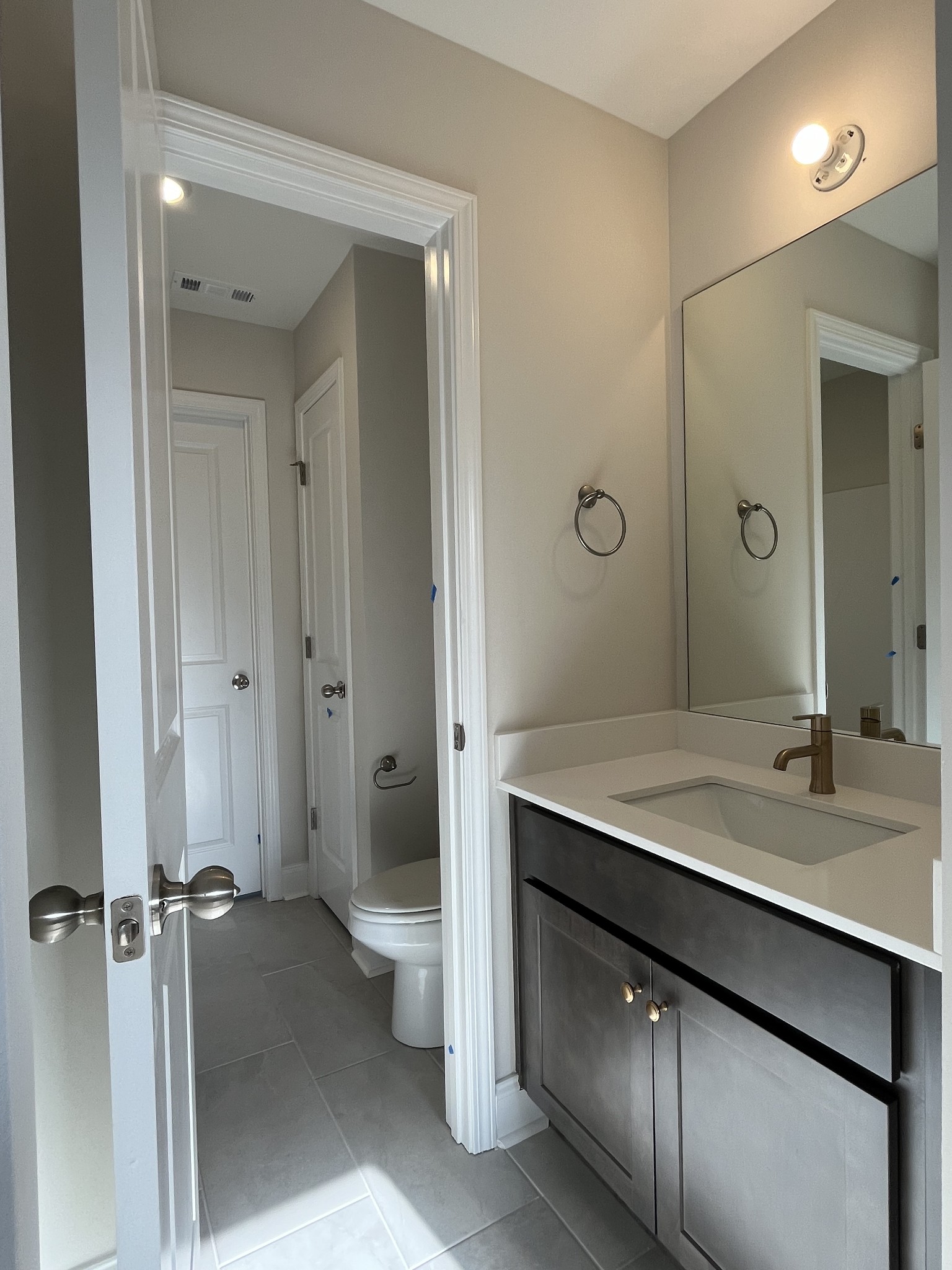 3232 Tasker Drive Antioch, TN 37013 - Photo 15 of 19 a bathroom with a sink and a mirror