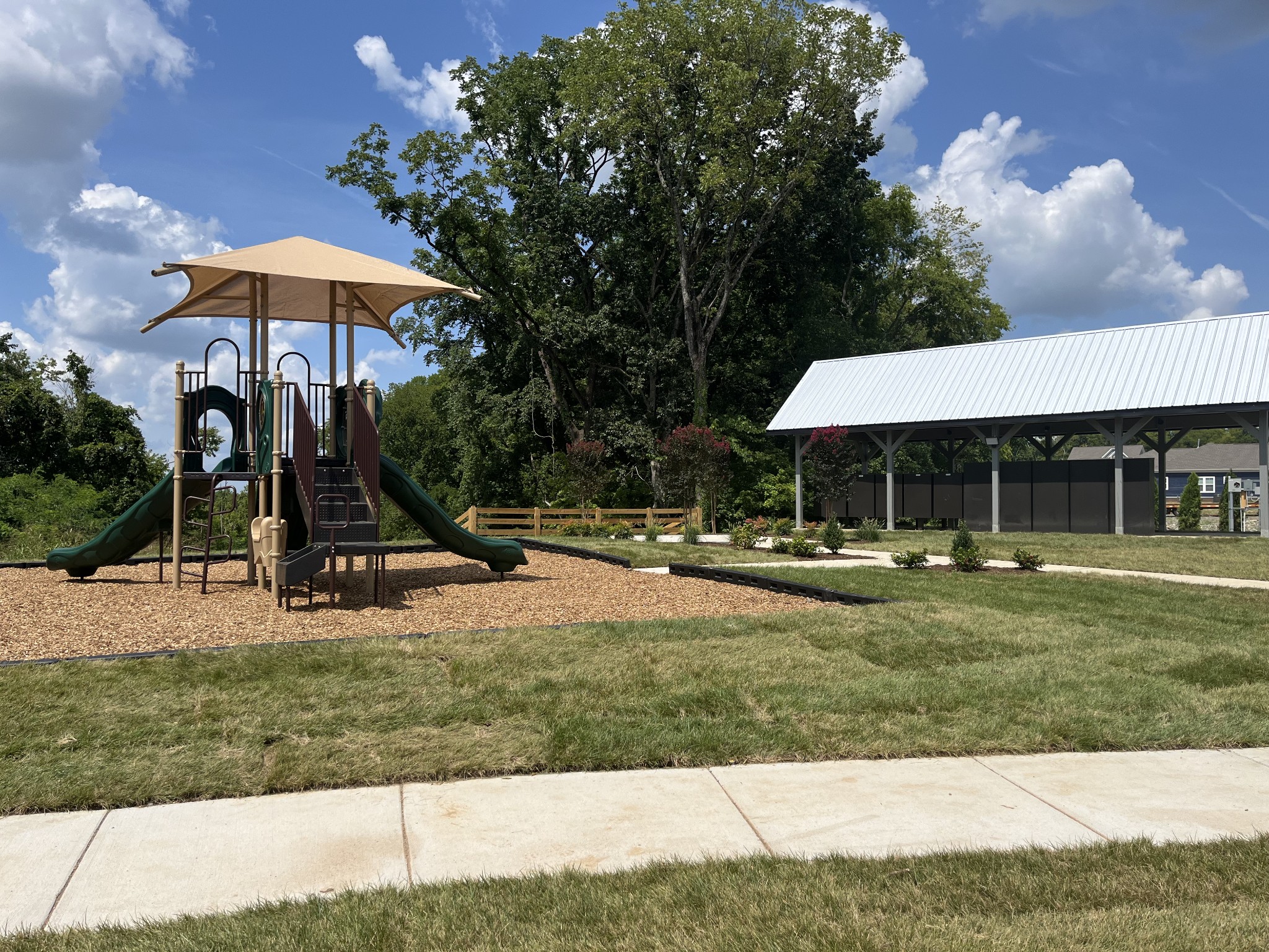 3232 Tasker Drive Antioch, TN 37013 - Photo 17 of 19 a view of a table and chairs under an umbrella