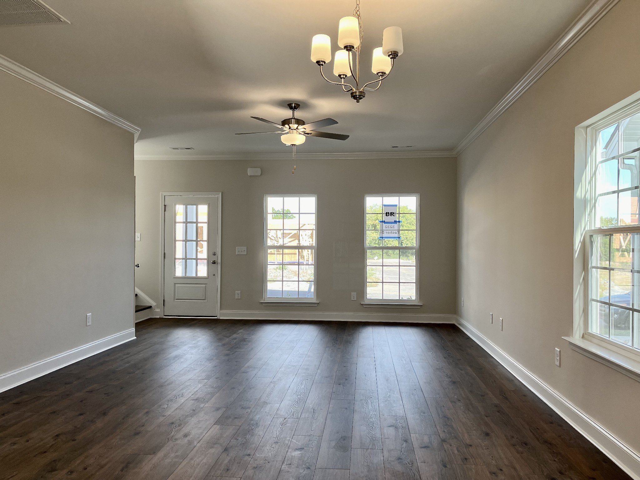 3232 Tasker Drive Antioch, TN 37013 - Photo 3 of 19 a view of an empty room with wooden floor and fan