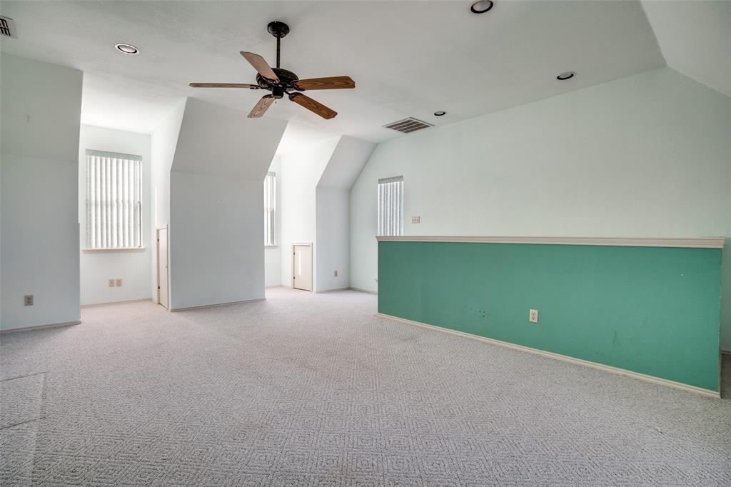 211 Bayne Road Haslet, TX 76052 - Photo 14 of 18 a view of a room with a fan and a ceiling fan