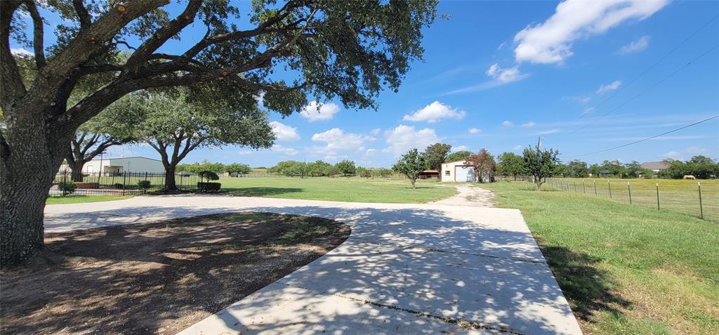 211 Bayne Road Haslet, TX 76052 - Photo 2 of 18 a view of lake with outdoor space