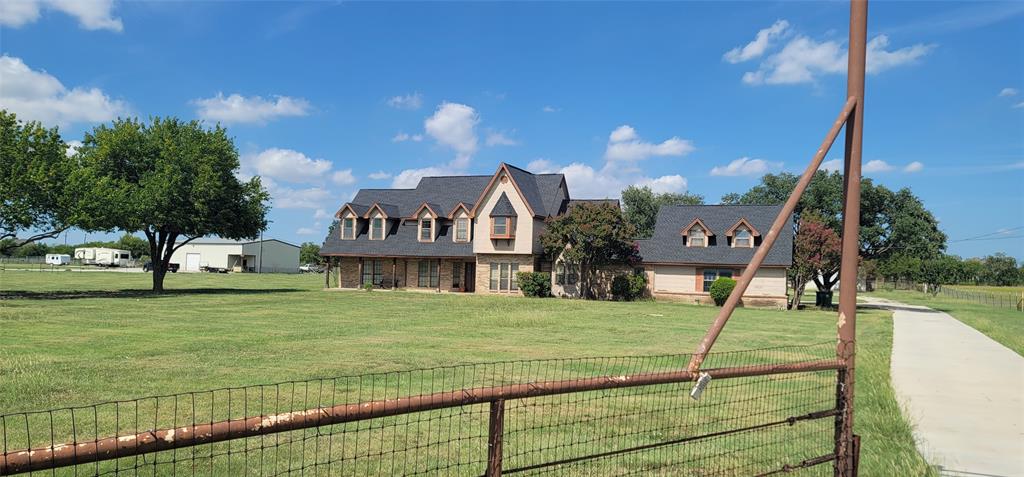 211 Bayne Road Haslet, TX 76052 - Photo 6 of 18 a view of a house with a big yard