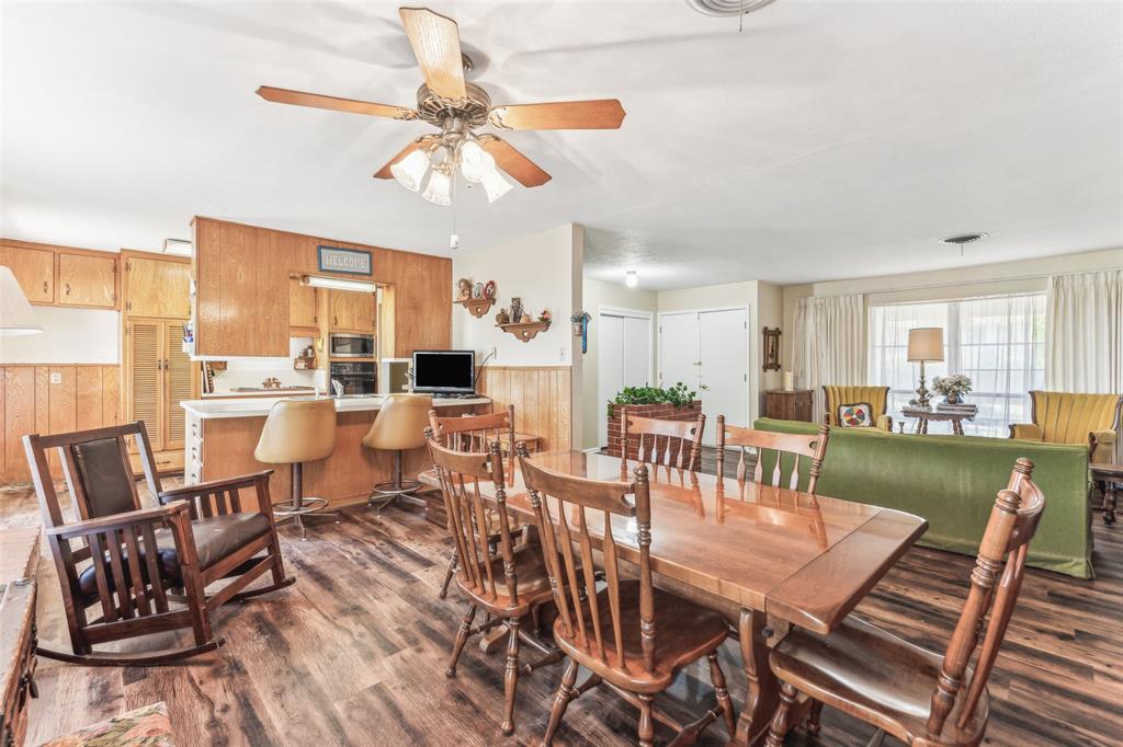 3055 Midway Road Grapevine, TX 76092 - Photo 25 of 40 a view of a dining room with furniture window and wooden floor