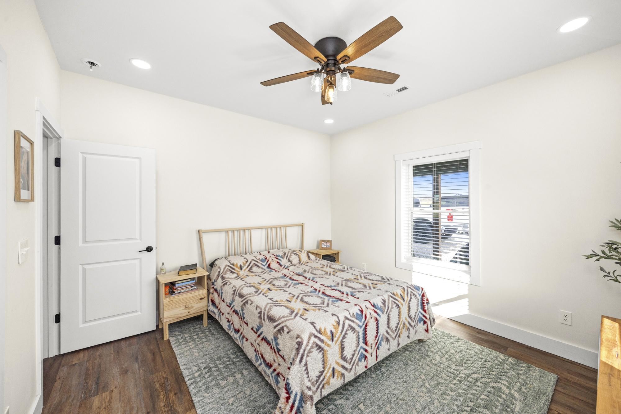 154 North Old Military Road Summertown, TN 38483 - Photo 15 of 45 a bedroom with a bed and a window