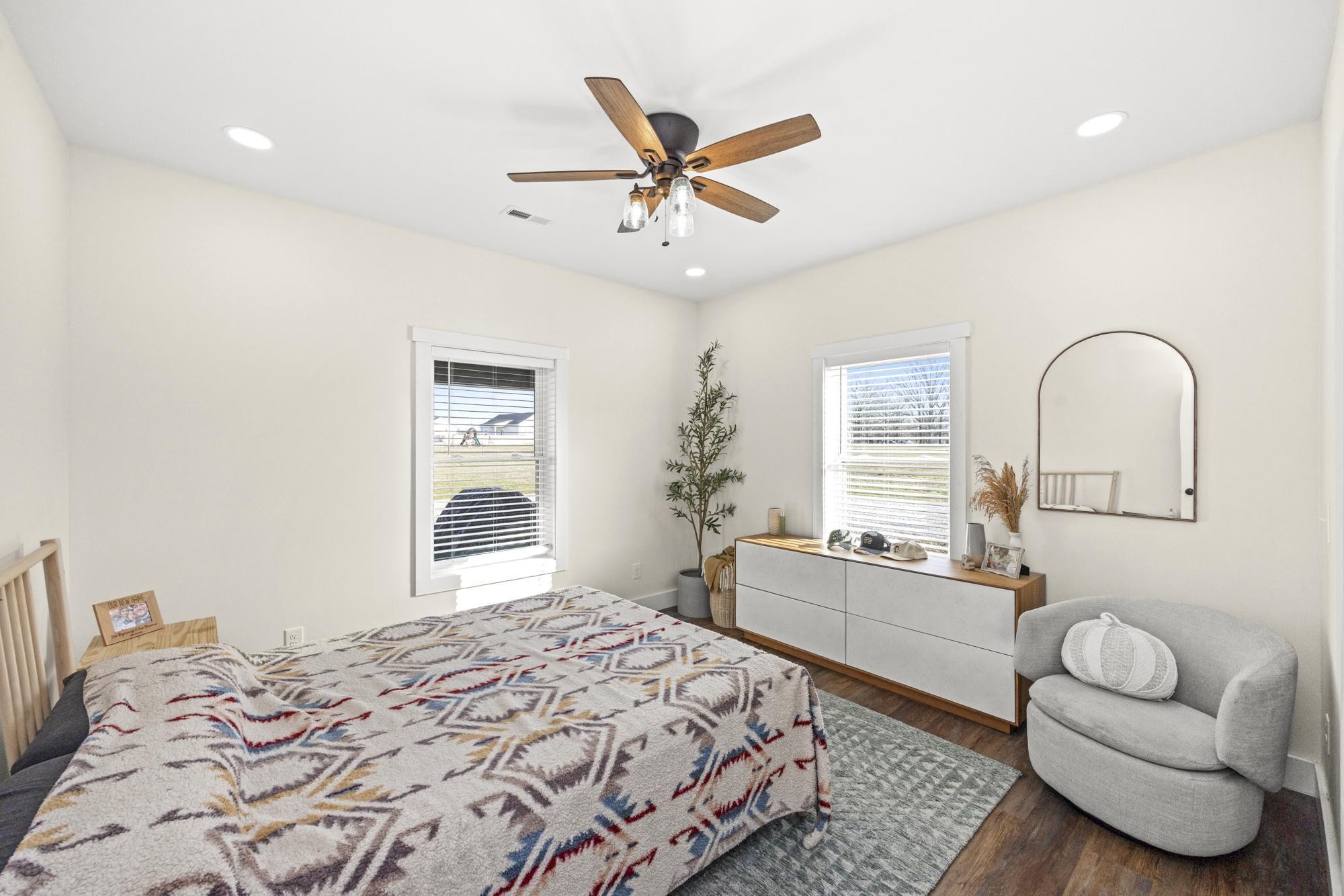 154 North Old Military Road Summertown, TN 38483 - Photo 16 of 45 a bedroom with a bed couch and window