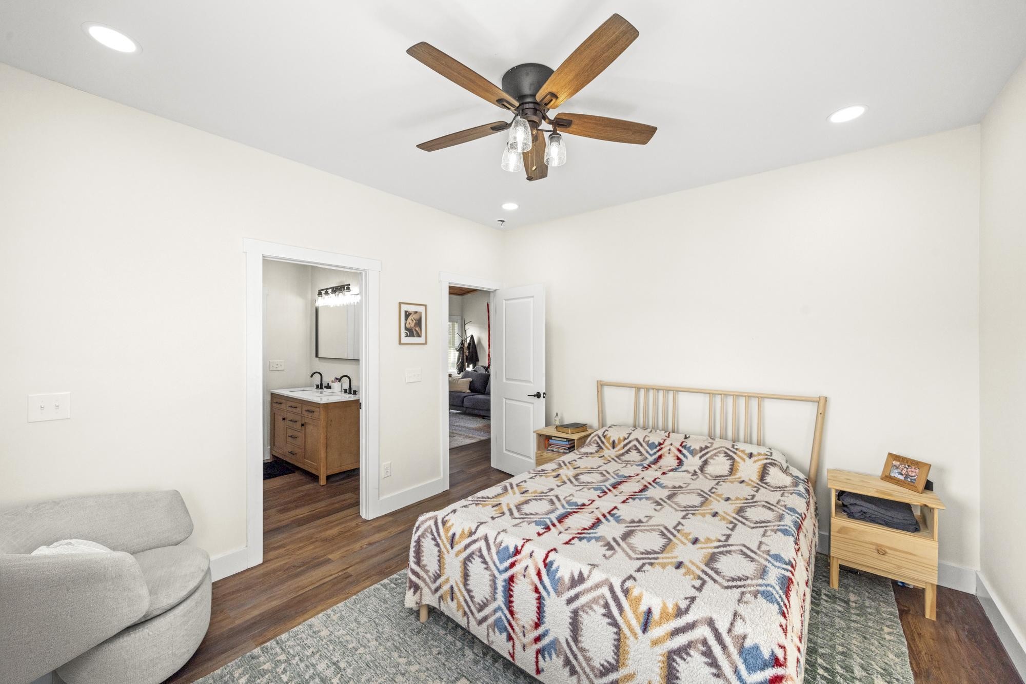 154 North Old Military Road Summertown, TN 38483 - Photo 18 of 45 a bed room with a bed and a couch