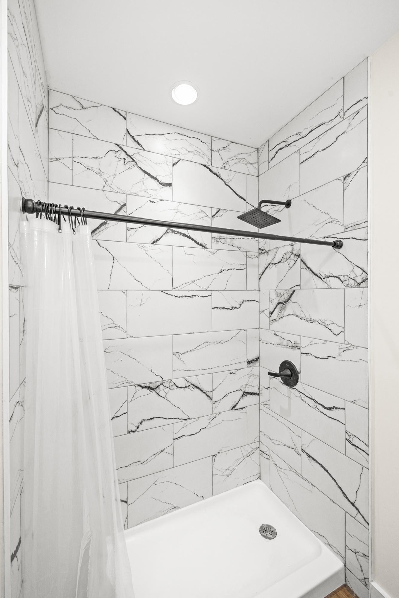 154 North Old Military Road Summertown, TN 38483 - Photo 20 of 45 a bathroom with a shower and a shower head