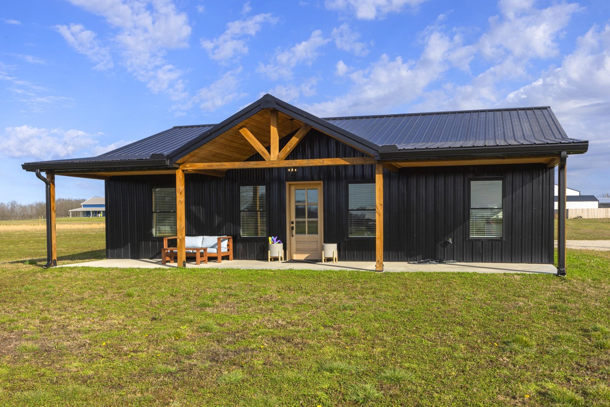 154 North Old Military Road Summertown, TN 38483 - Photo 2 of 45 a front view of a house with a yard