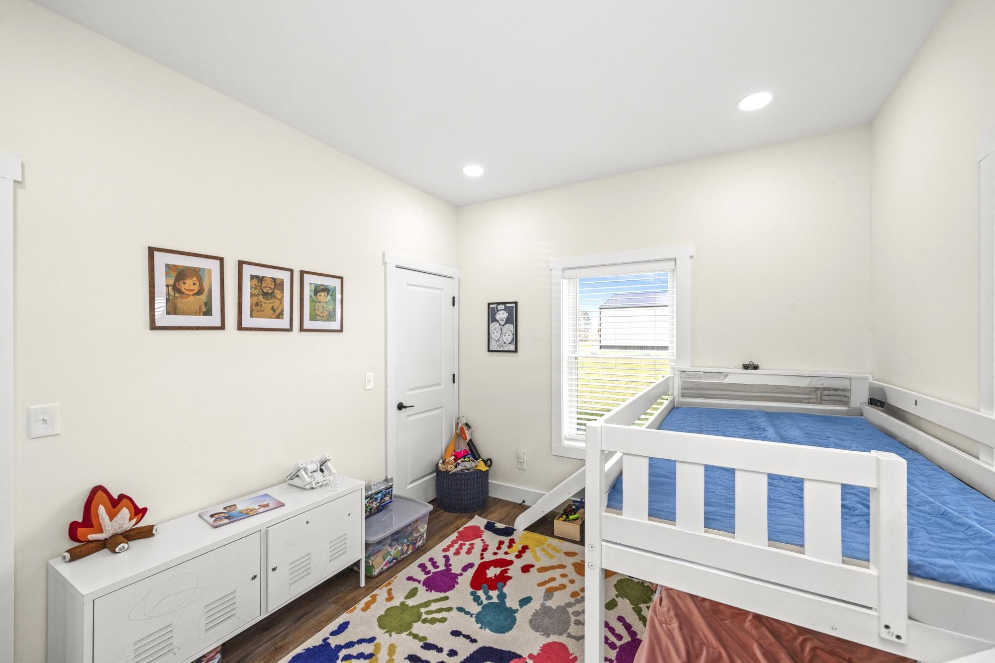 154 North Old Military Road Summertown, TN 38483 - Photo 24 of 45 a living room with baby crib furniture and a window