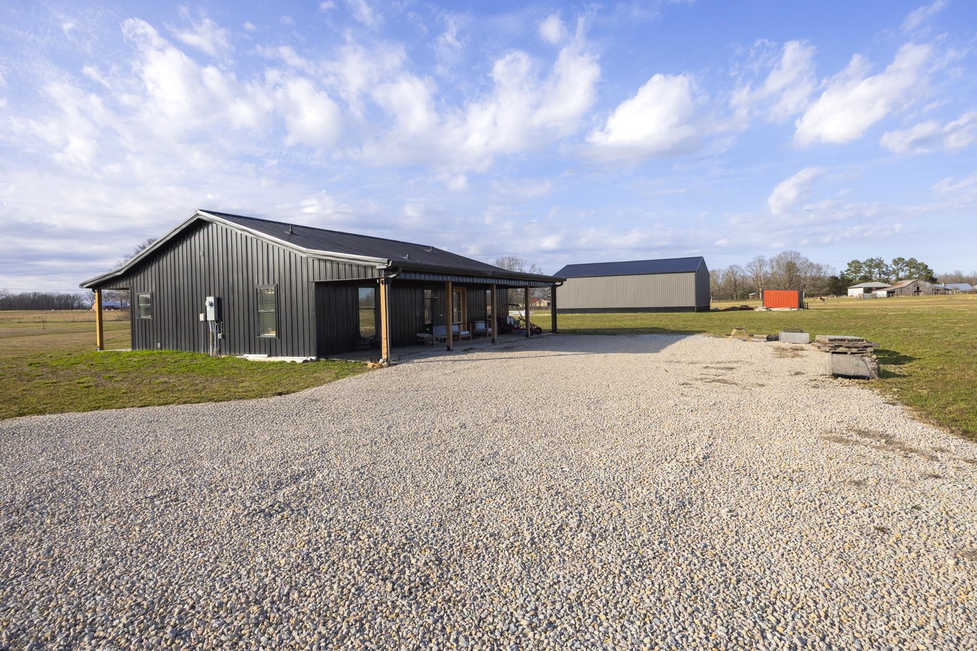 154 North Old Military Road Summertown, TN 38483 - Photo 33 of 45 a view of a house with a yard and sitting area