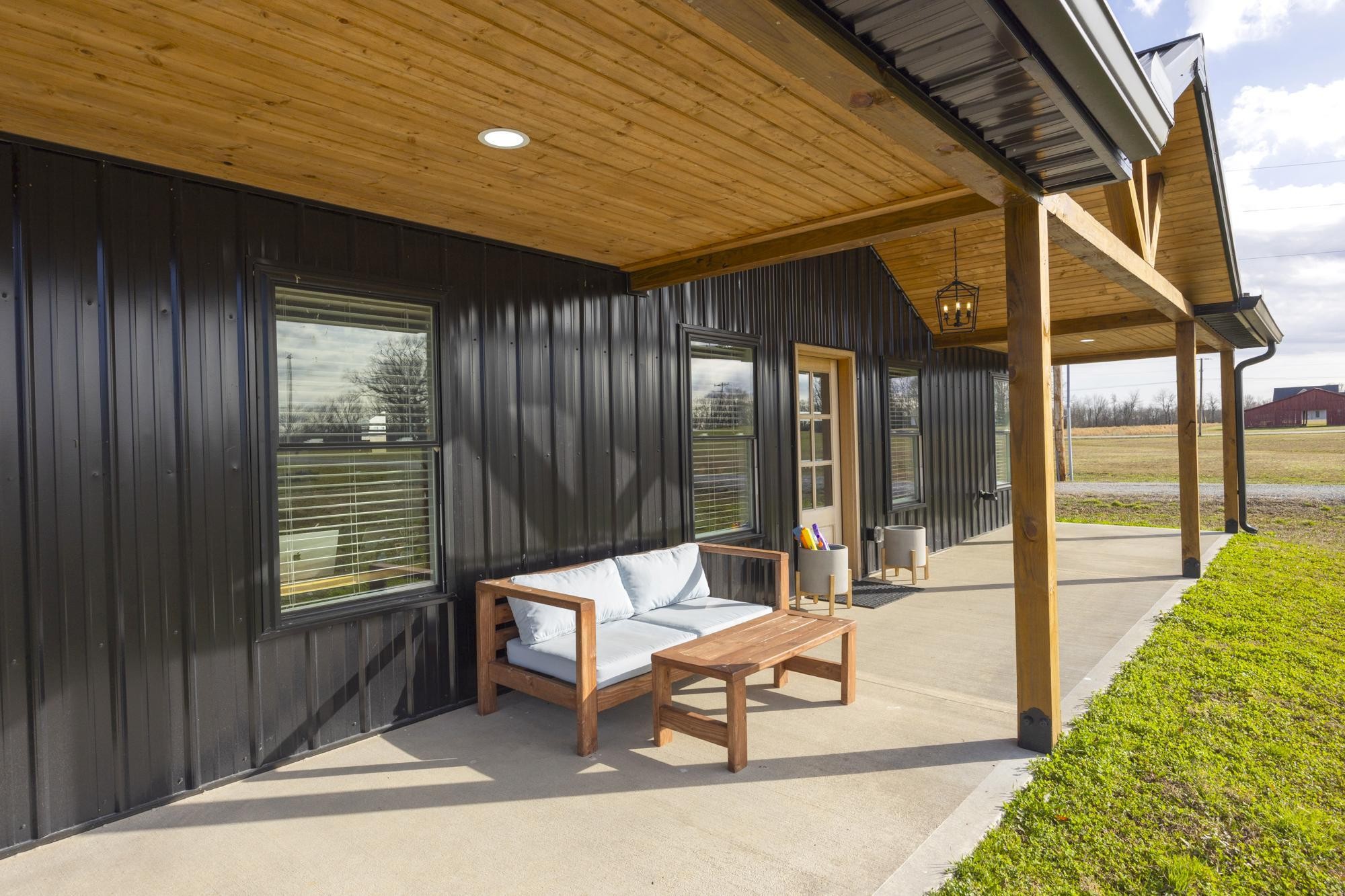 154 North Old Military Road Summertown, TN 38483 - Photo 5 of 45 a building outdoor space with seating