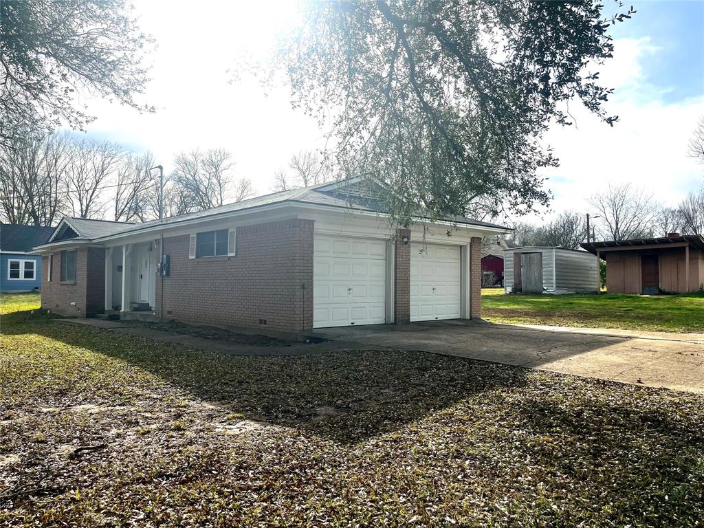 915 North Spring Street Grand Saline, TX 75140 - Photo 20 of 20 a view of a house with a yard