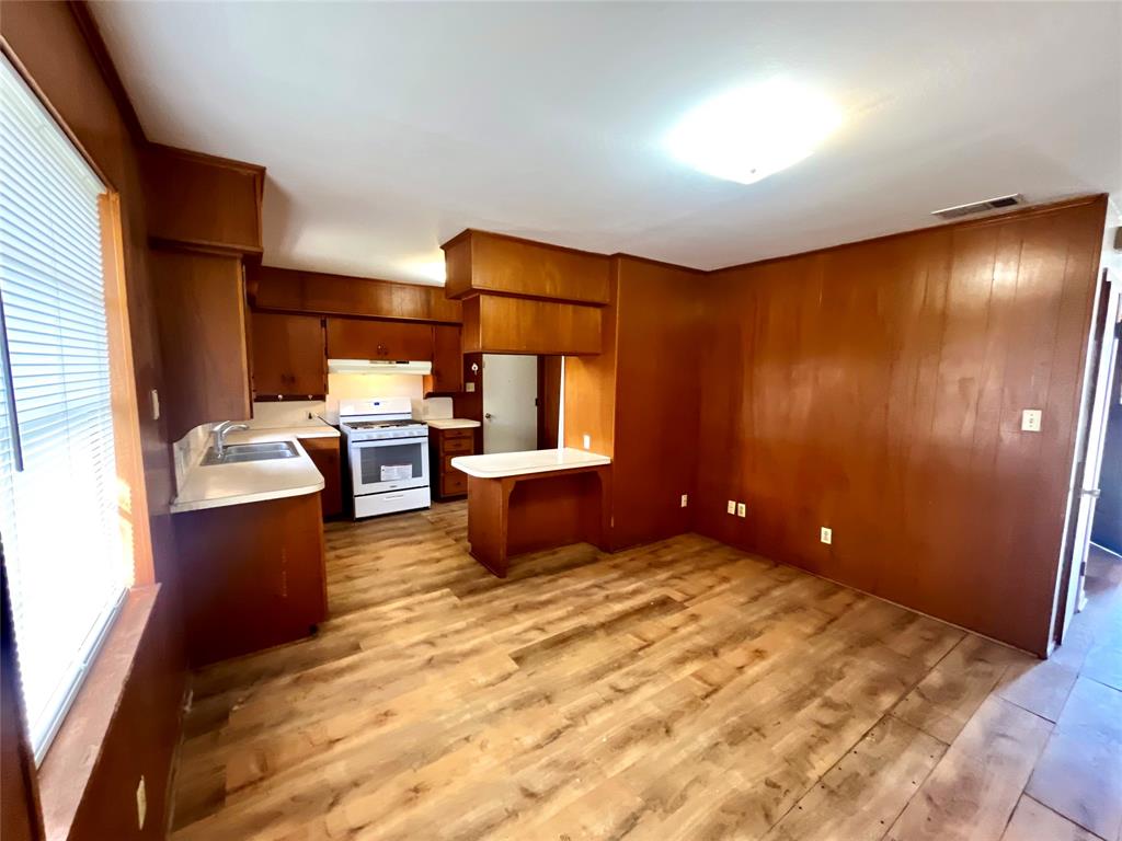 915 North Spring Street Grand Saline, TX 75140 - Photo 5 of 20 a view of a room with outdoor seating