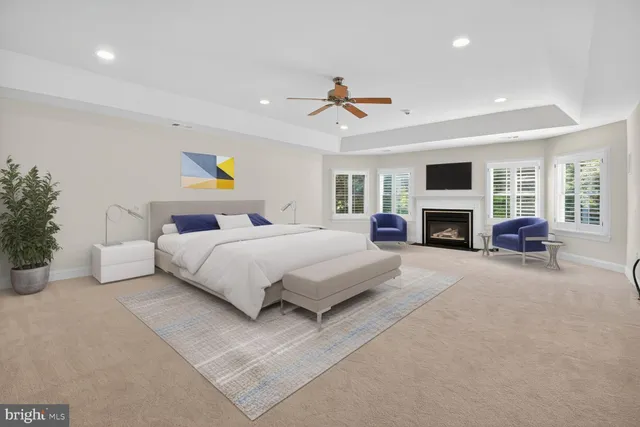 a en suite bathroom with a sink double vanity and a mirror