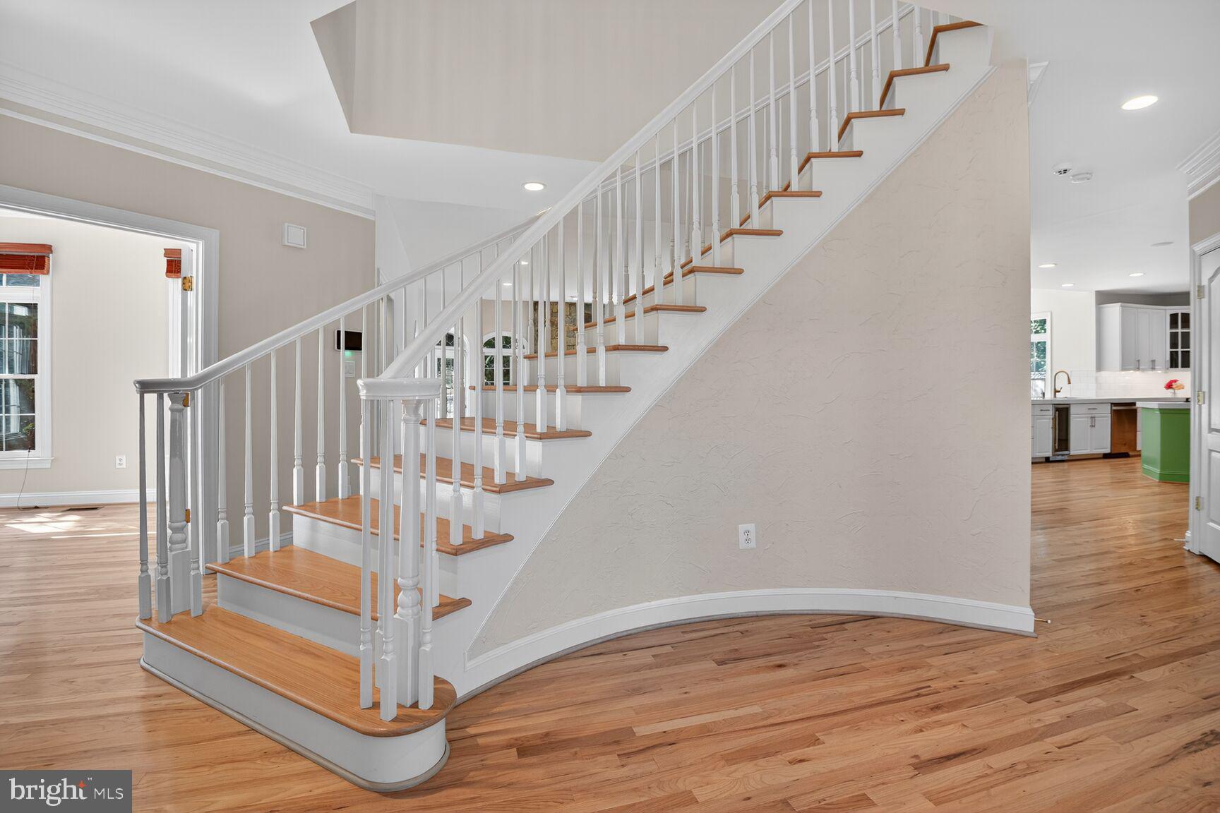 9914 Woodford Road Potomac, MD 20854 - Photo 28 of 87 a view of entryway and hall with wooden floor