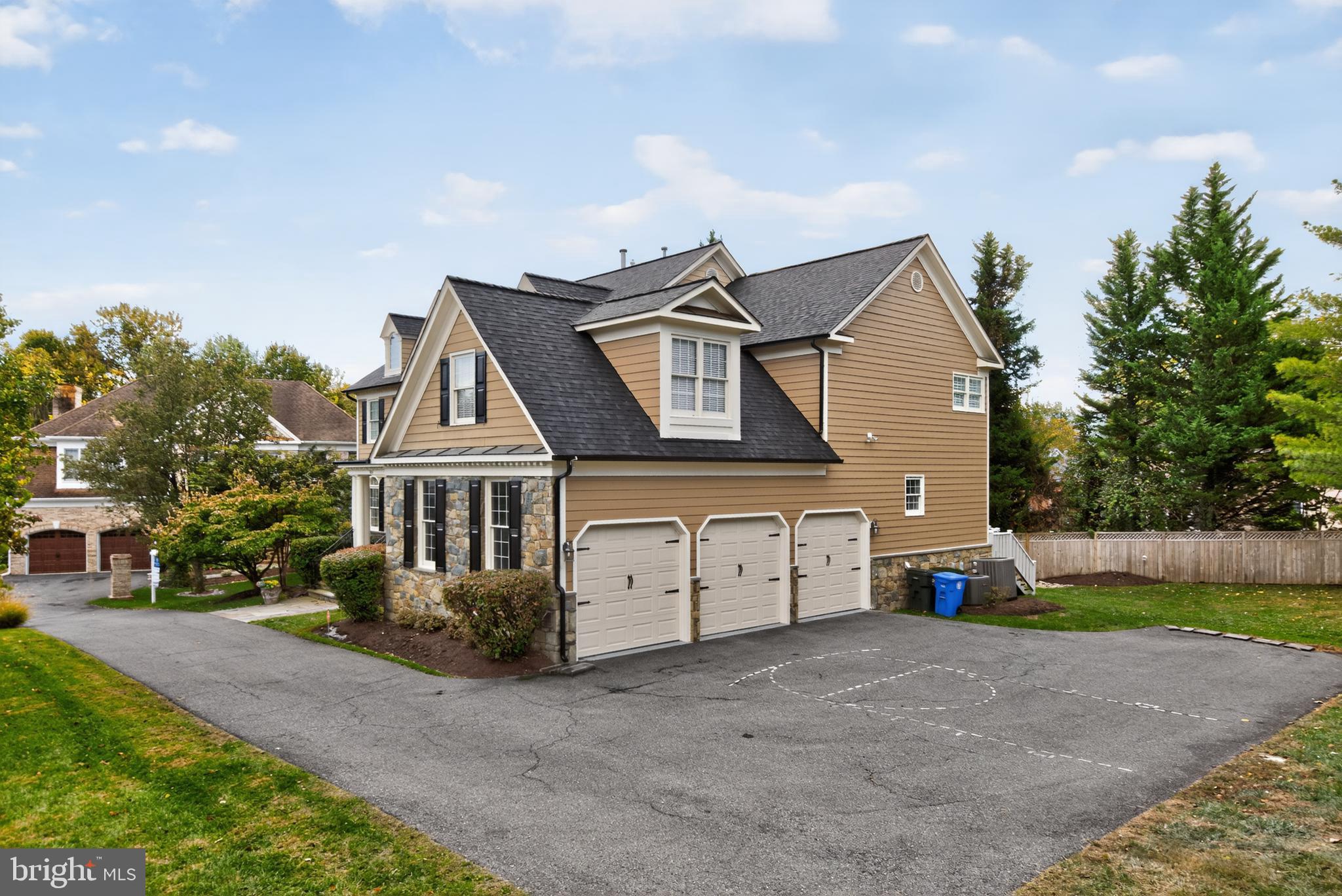 9914 Woodford Road Potomac, MD 20854 - Photo 3 of 87 front view of a house with a yard