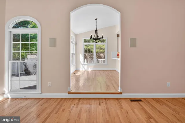 a view of a hallway with windows