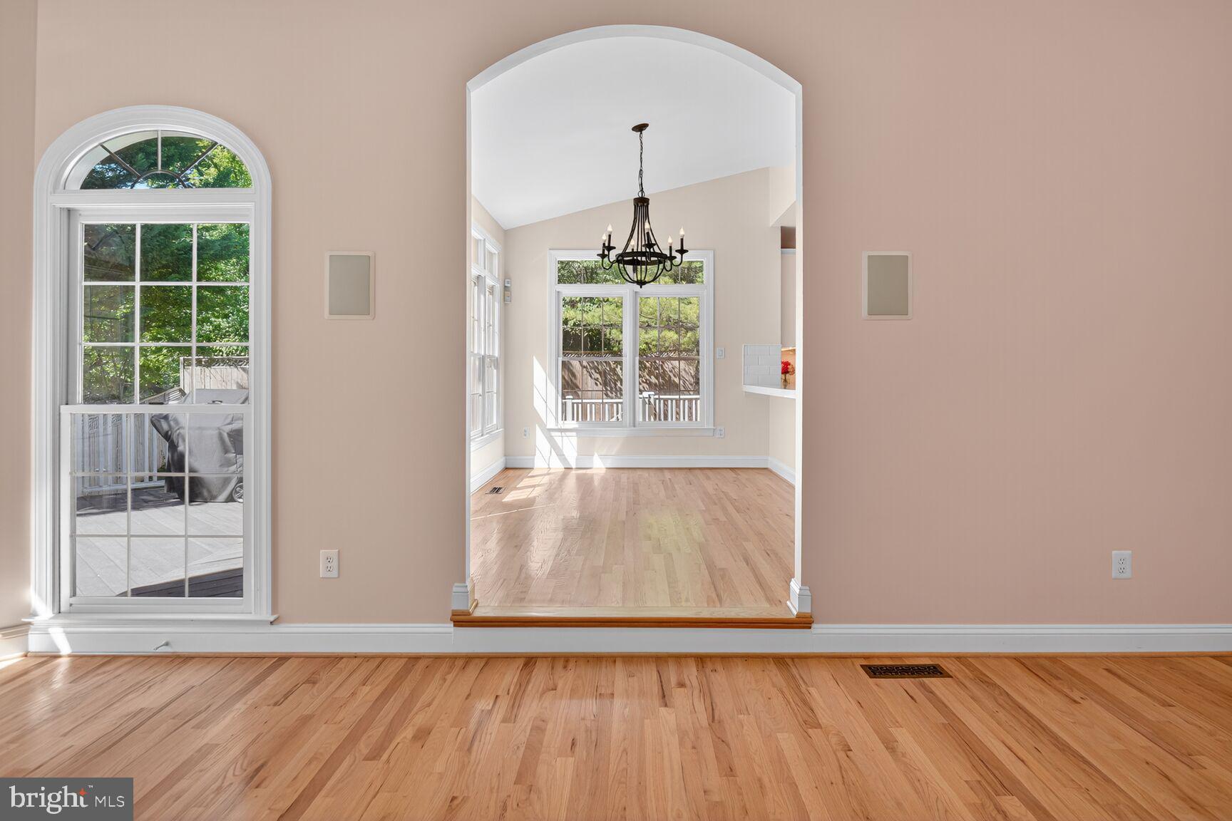 9914 Woodford Road Potomac, MD 20854 - Photo 38 of 87 a view of a room with wooden floor potted plants