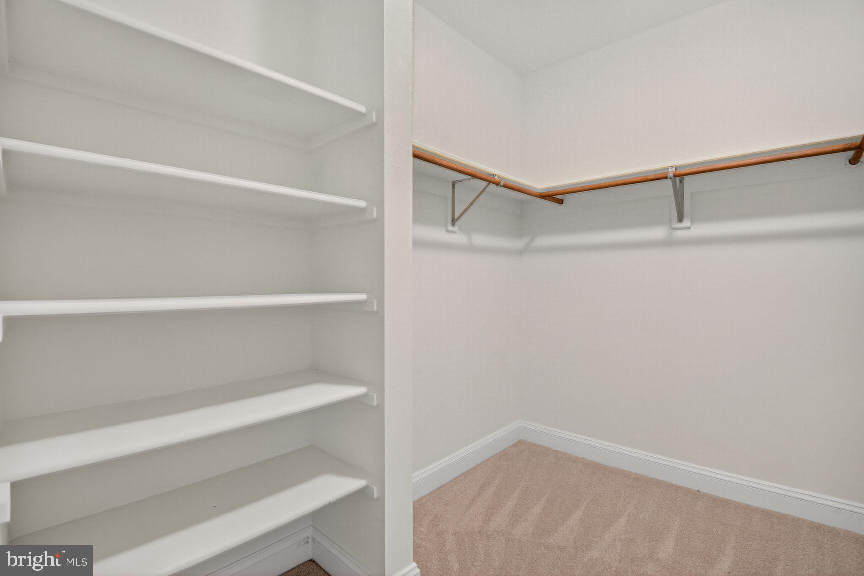 9914 Woodford Road Potomac, MD 20854 - Photo 53 of 87 a view of an empty walk in closet