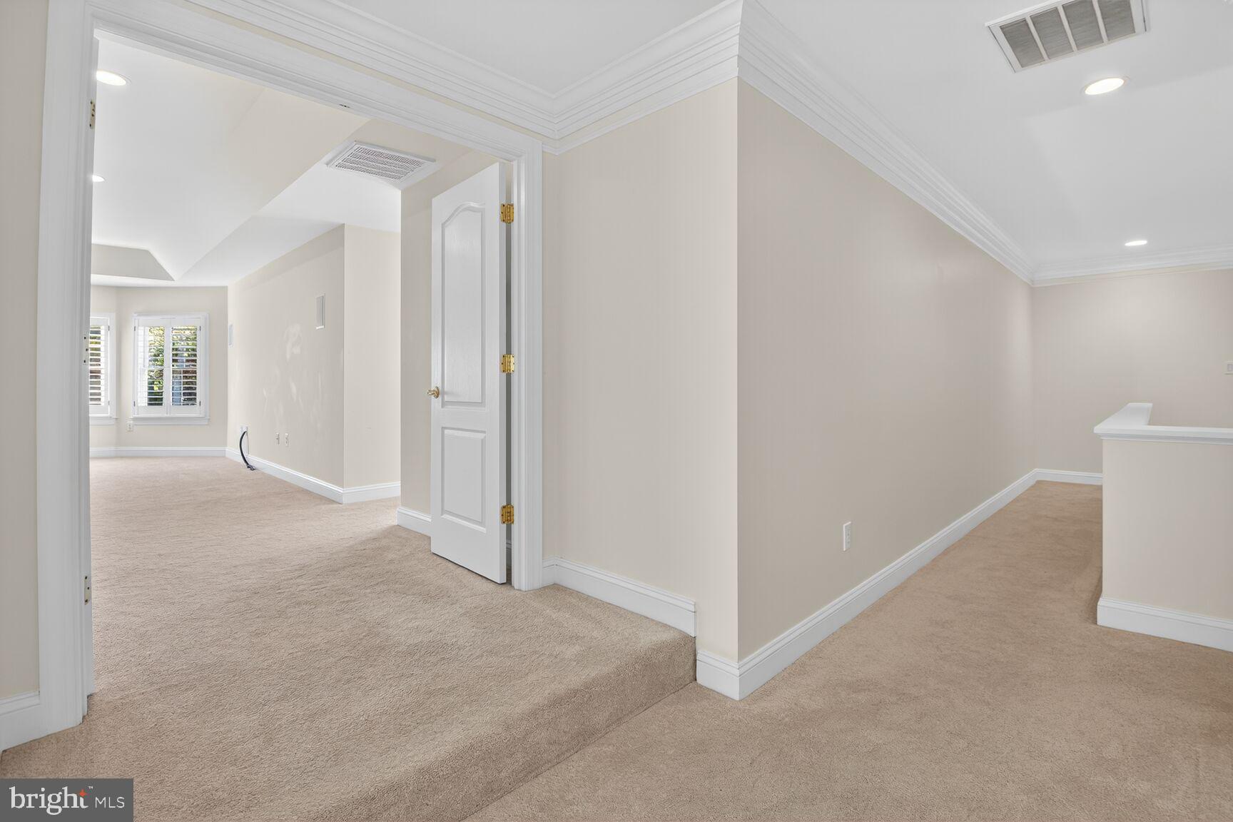 9914 Woodford Road Potomac, MD 20854 - Photo 57 of 87 a view of a room with a hallway