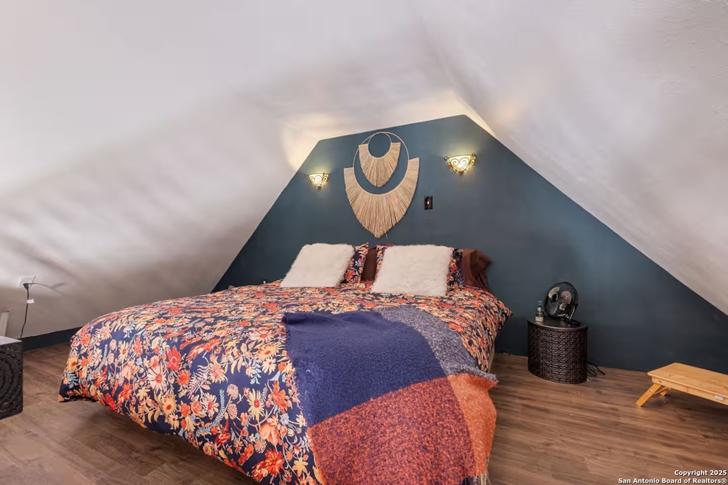 24159 Boerne Stage Road San Antonio, TX 78255 - Photo 27 of 100 a bedroom with a bed and a lamp on table