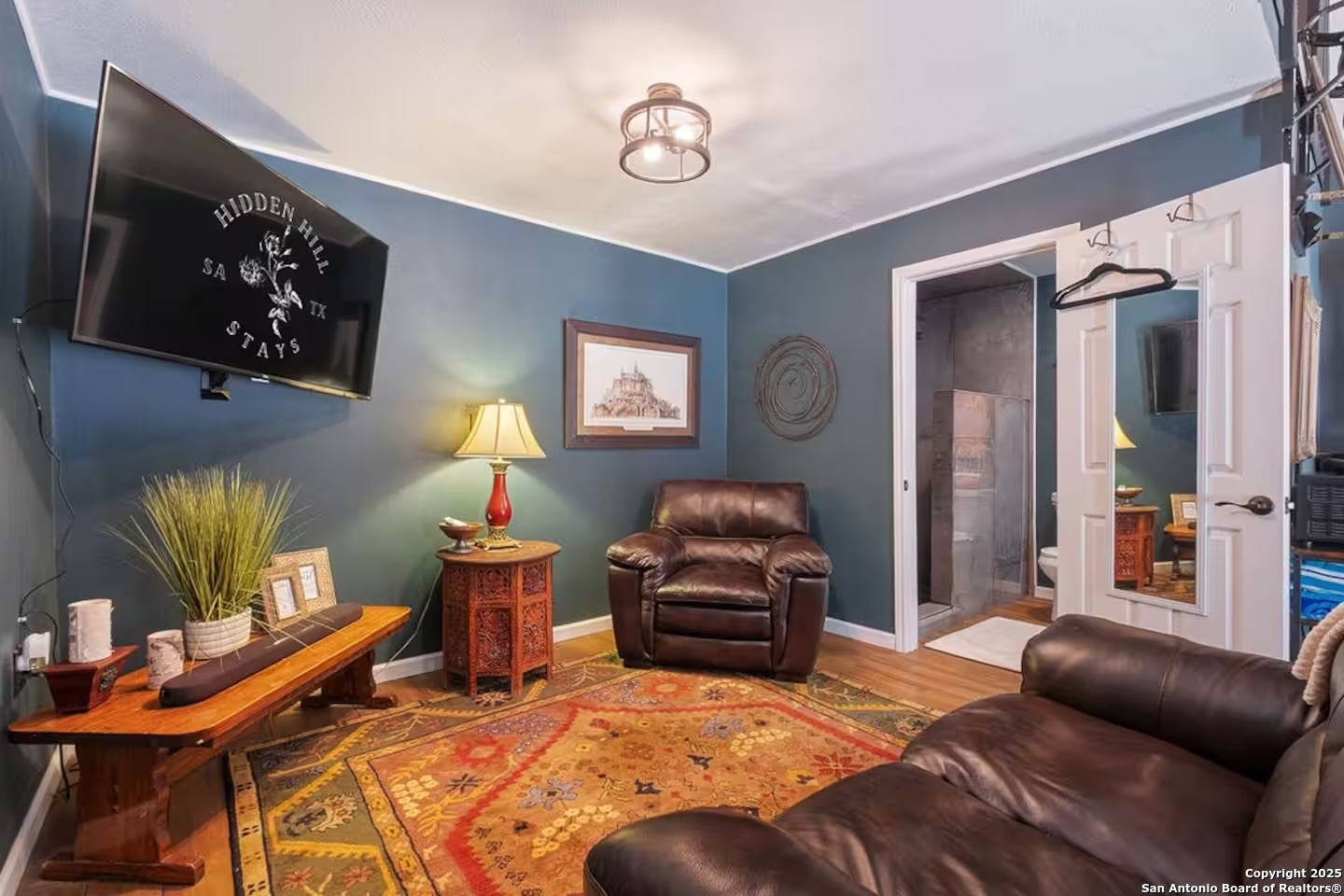 24159 Boerne Stage Road San Antonio, TX 78255 - Photo 28 of 100 a bedroom with furniture and a window