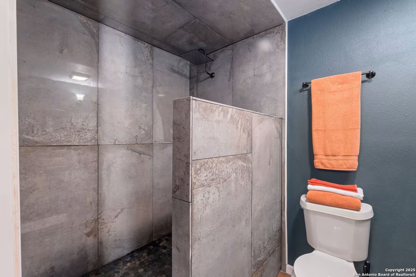 24159 Boerne Stage Road San Antonio, TX 78255 - Photo 31 of 100 a white toilet sitting next to a bathroom sink