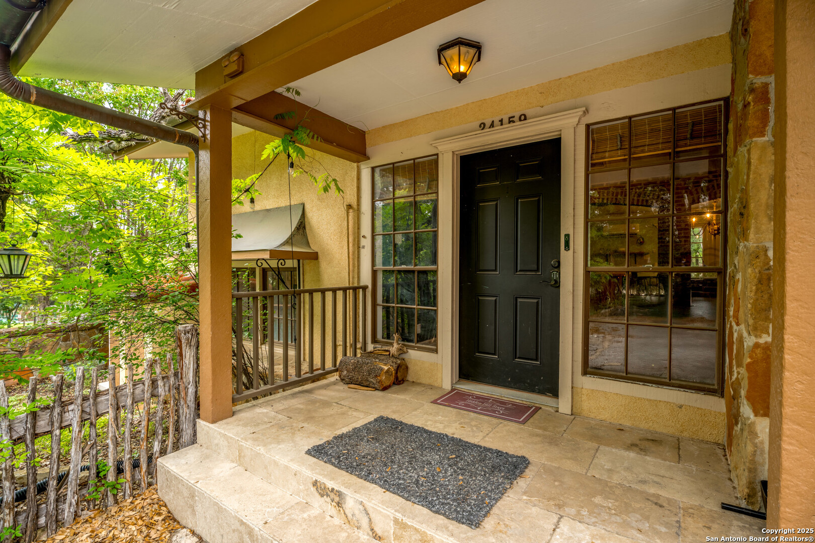 24159 Boerne Stage Road San Antonio, TX 78255 - Photo 55 of 100 a view of a entrance door of the house