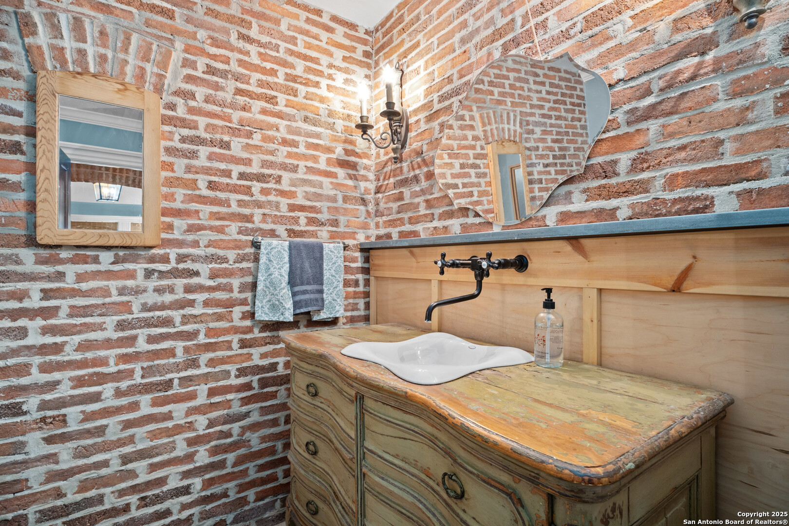 24159 Boerne Stage Road San Antonio, TX 78255 - Photo 67 of 100 a bathroom with a sink and a shower