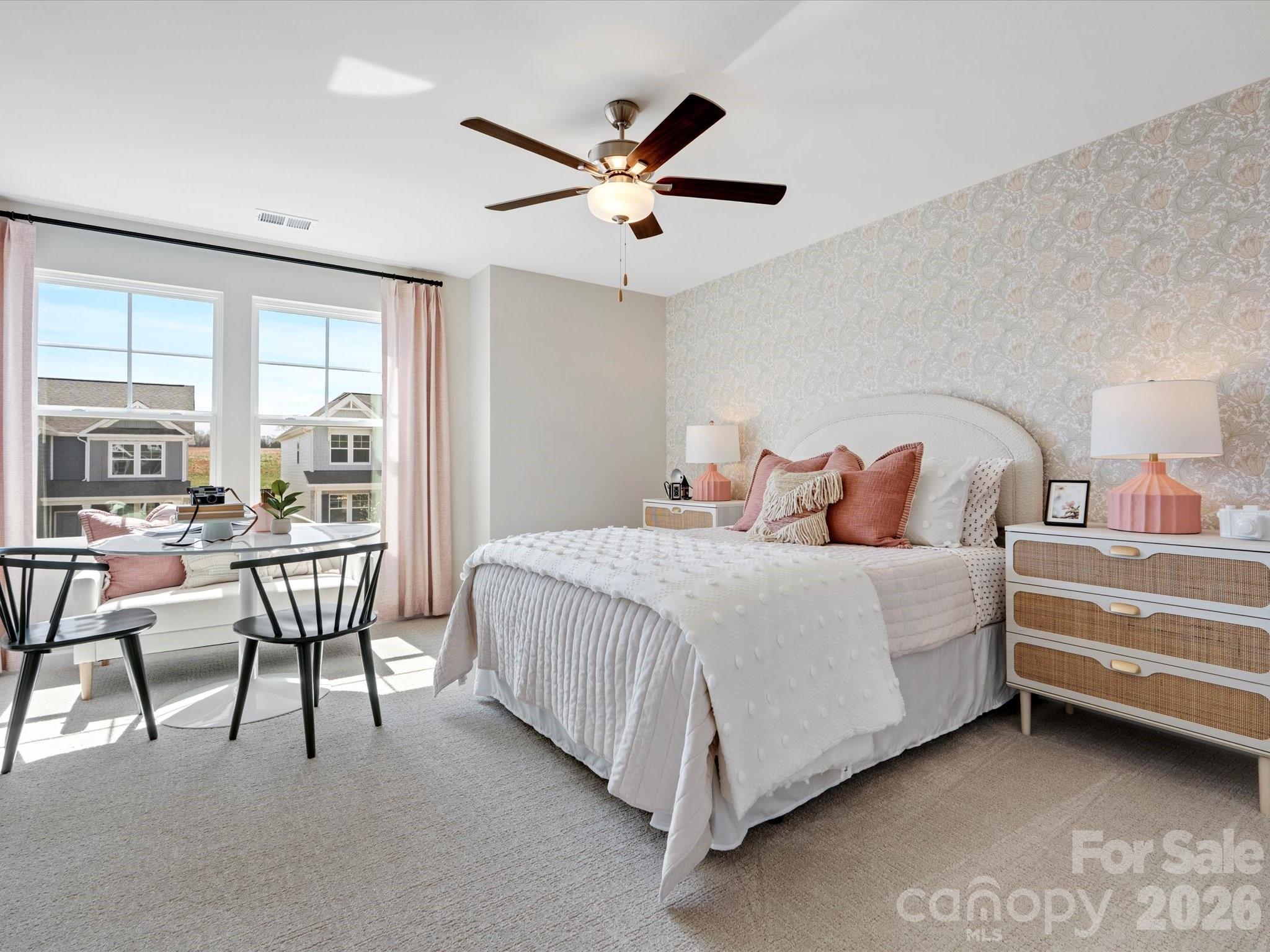 4050 Puddle Pond Road Indian Trail, NC 28079 - Photo 18 of 22 a bedroom with a bed and a table
