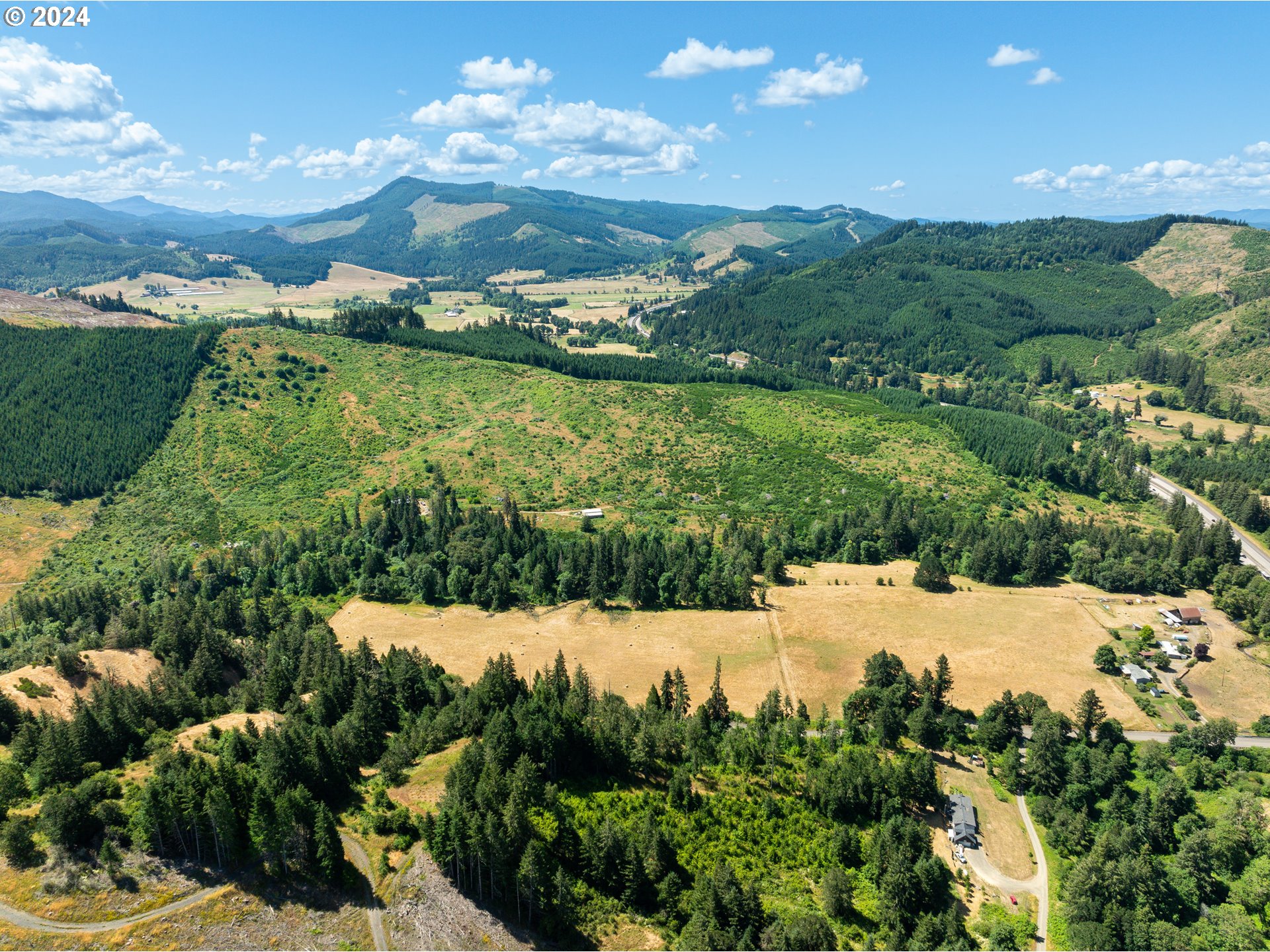 699 Cox Road Yoncalla, OR 97499 - Photo 10 of 35 a view of a lake with a houses