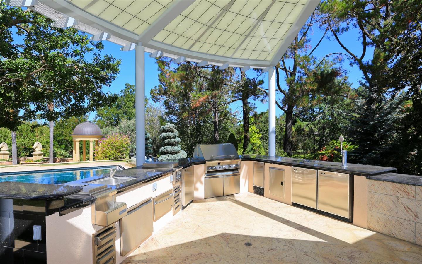 24289 Hillview Road Los Altos Hills, CA 94024 - Photo 26 of 32 a view of a chair and tables in the balcony