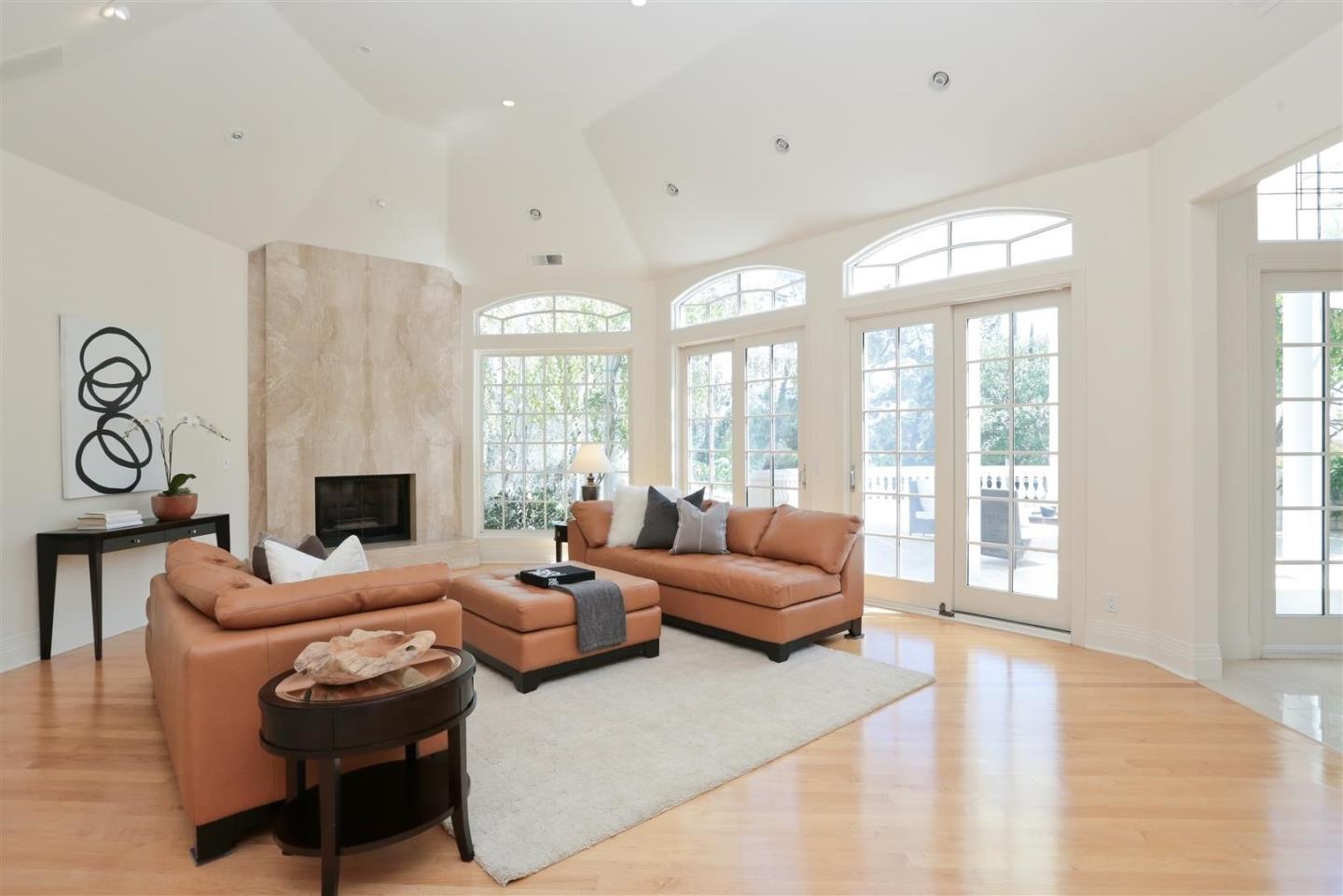 24289 Hillview Road Los Altos Hills, CA 94024 - Photo 7 of 32 a living room with furniture and a fireplace
