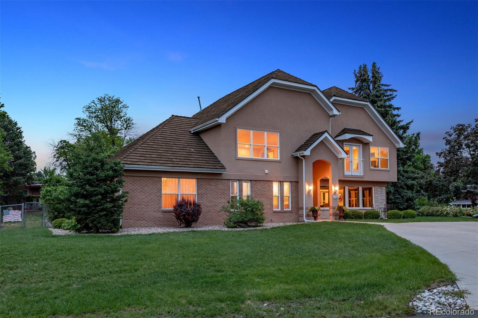 22 Rangeview Drive Wheat Ridge, CO 80215 - Photo 2 of 40 a front view of a house with a yard